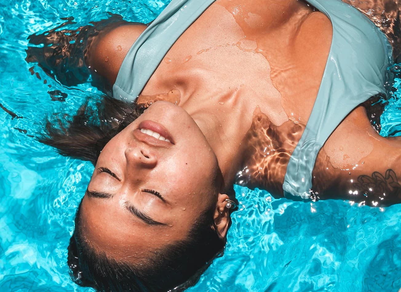 Person floating in water
